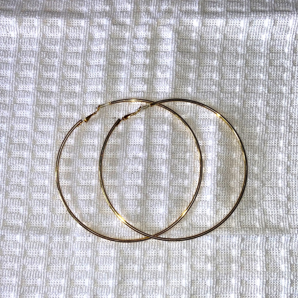 Large loop gold plated earrings